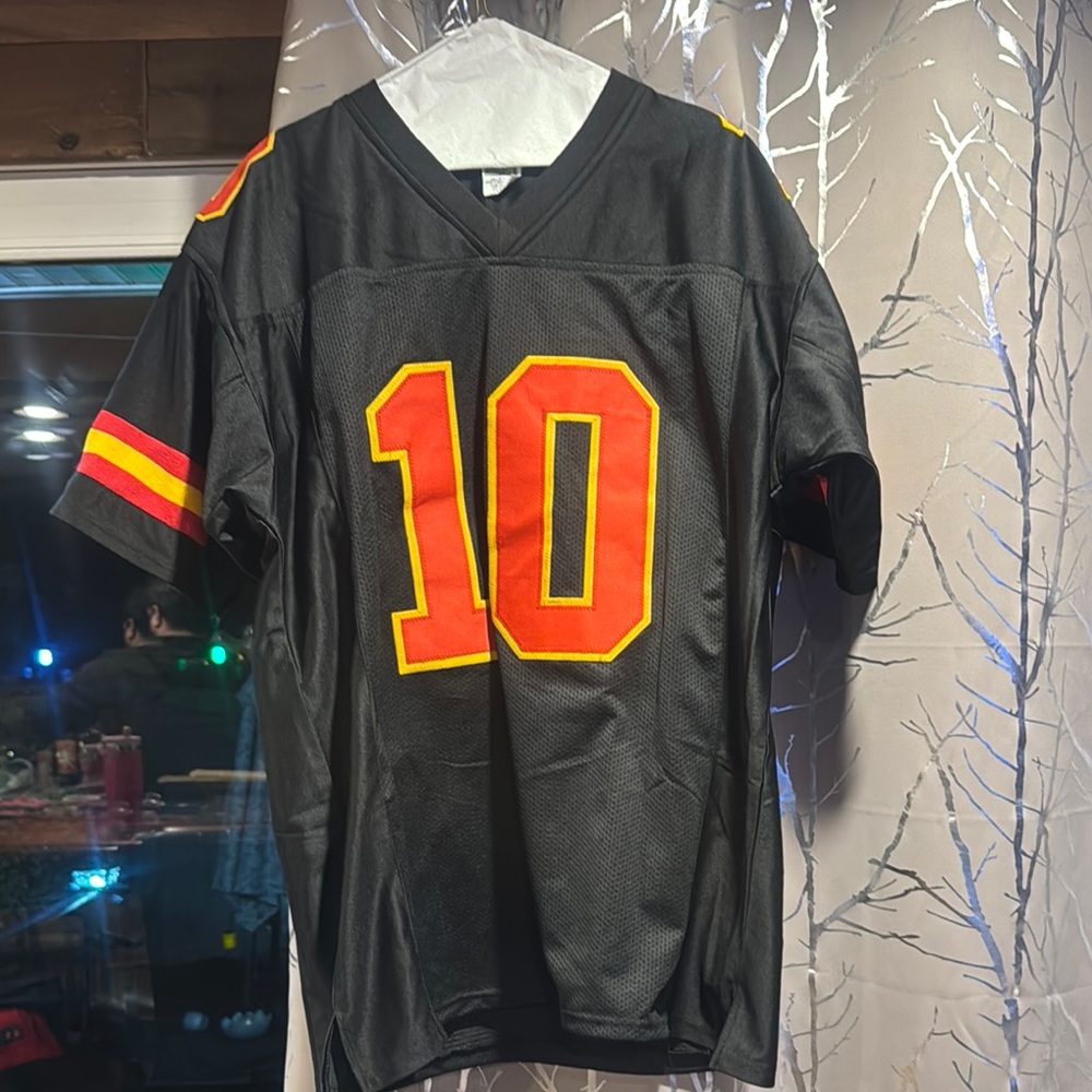 Black Football Jersey with Red and Yellow Number 10
